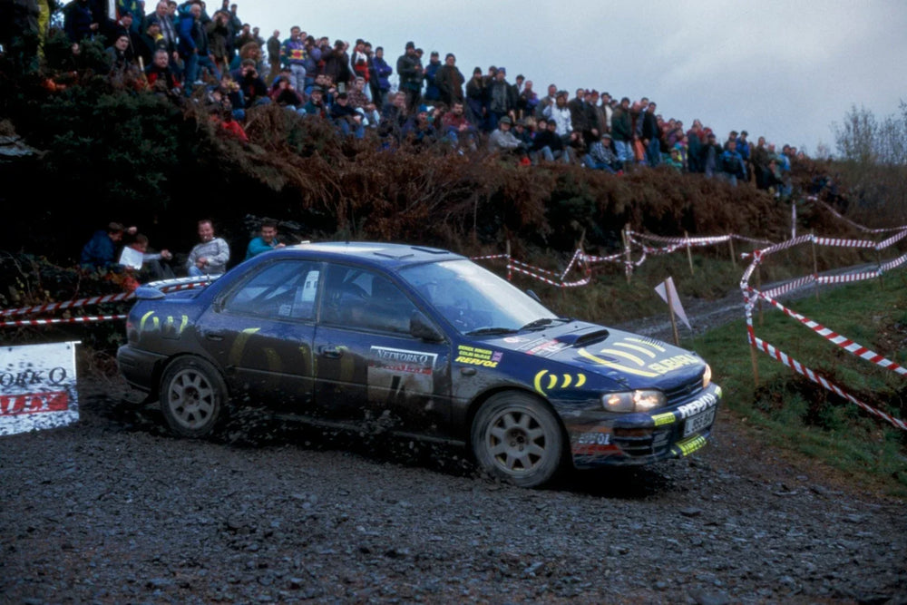 Colin McRae and Derek Ringer in the number 4 Subaru Impreza at the 1995 RAC Rally.